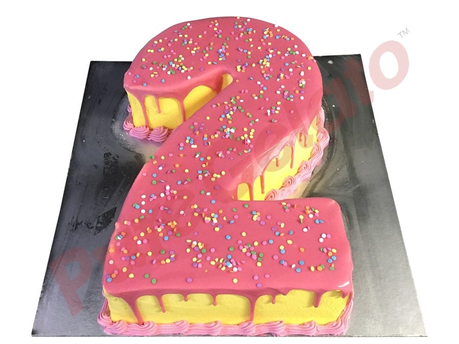 numeral-cake-2-pink-choc-drip-yellow-creamsprinkles